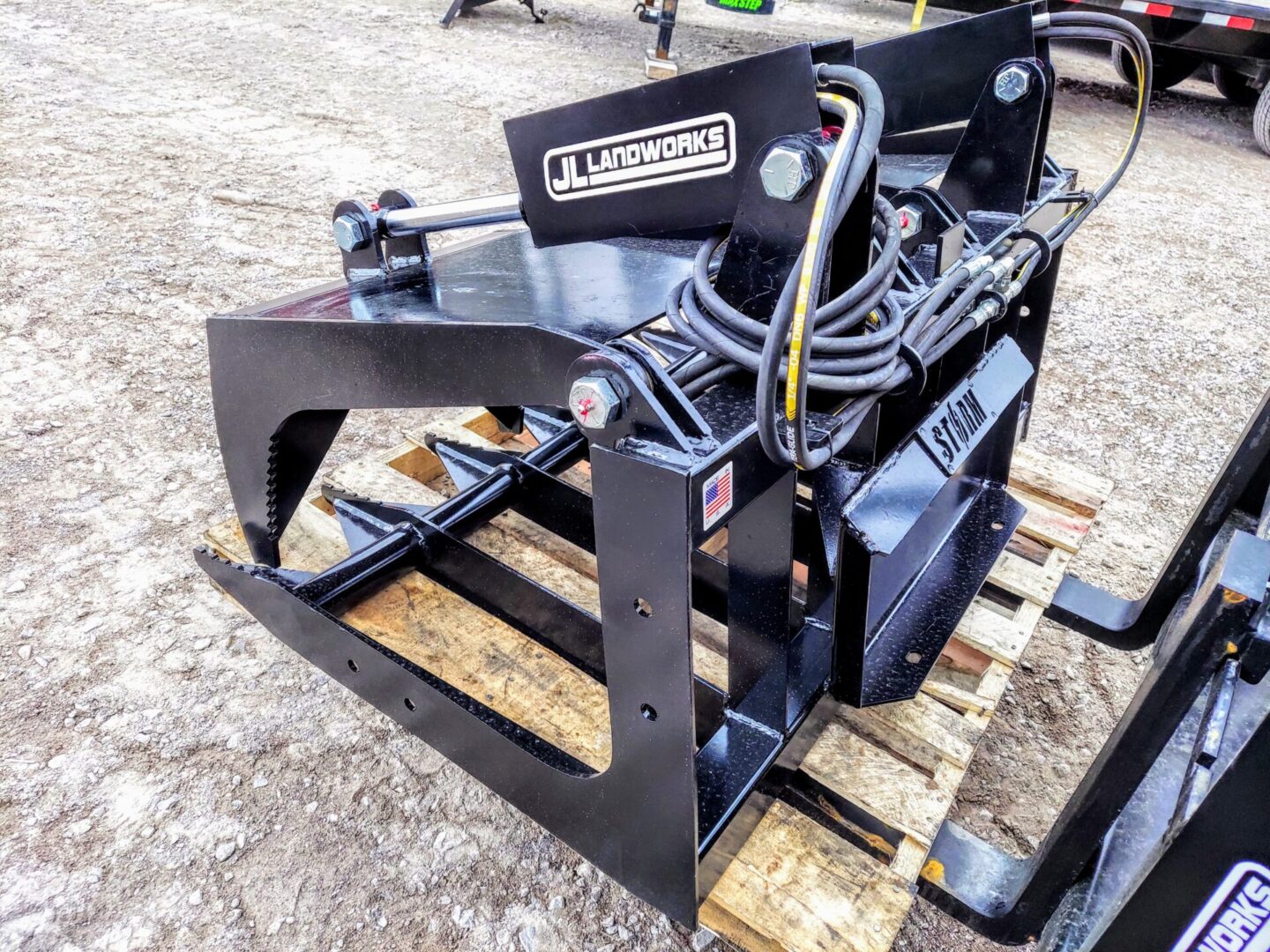 A black machine sitting on top of a wooden platform.