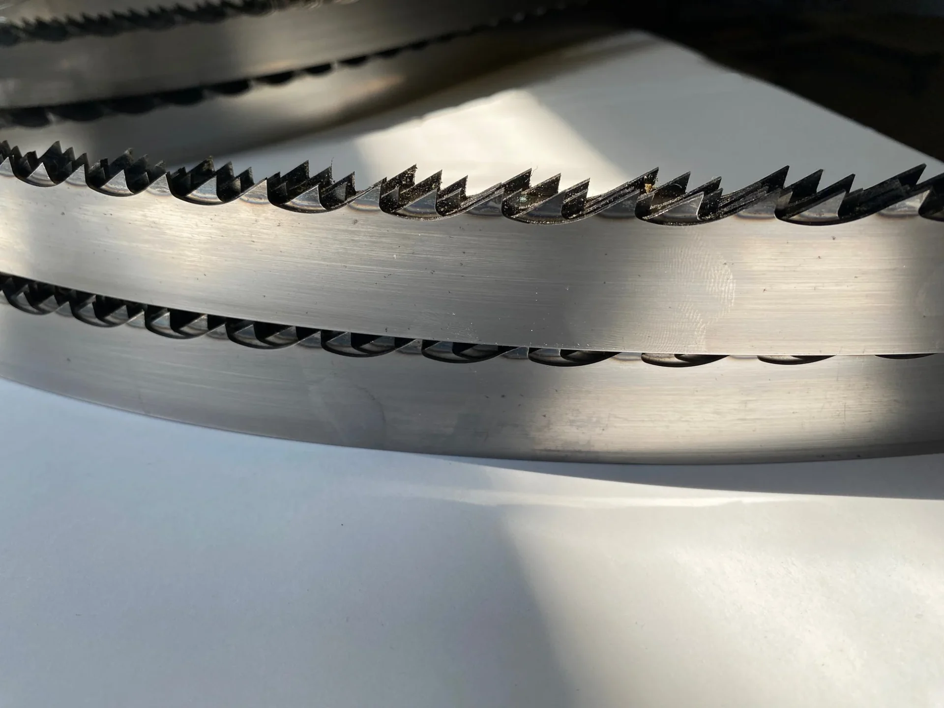 A close up of some metal blades on a table