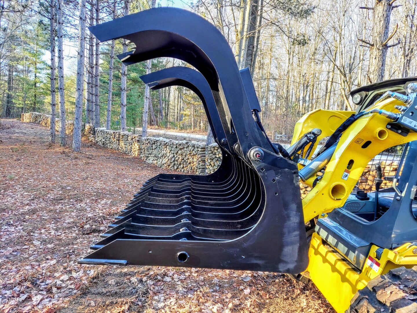 A close up of the back end of a yellow and black machine