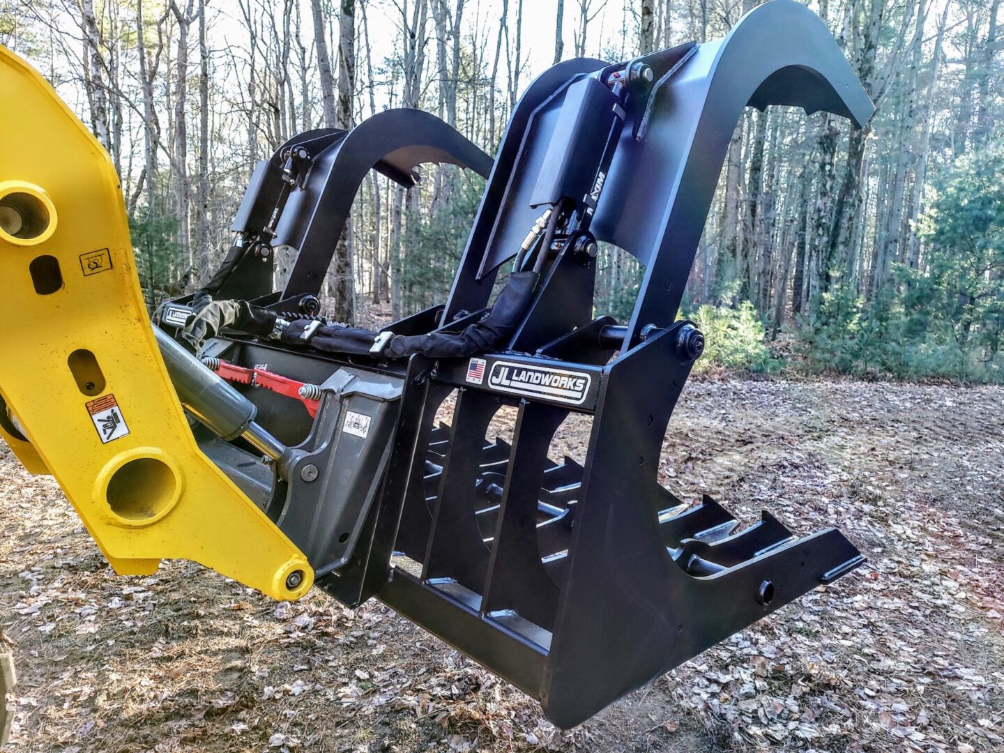 A close up of the back end of a grapple bucket.