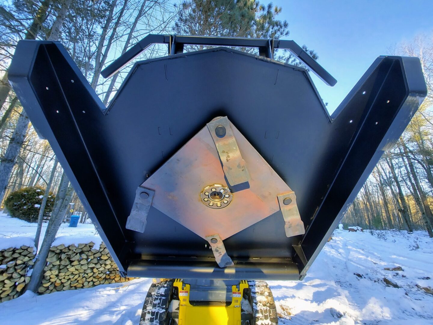 A close up of the back of a snow plow