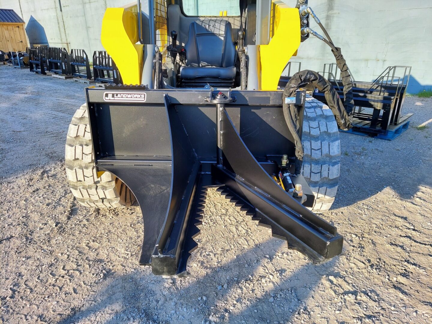 A close up of the front end of a skid steer