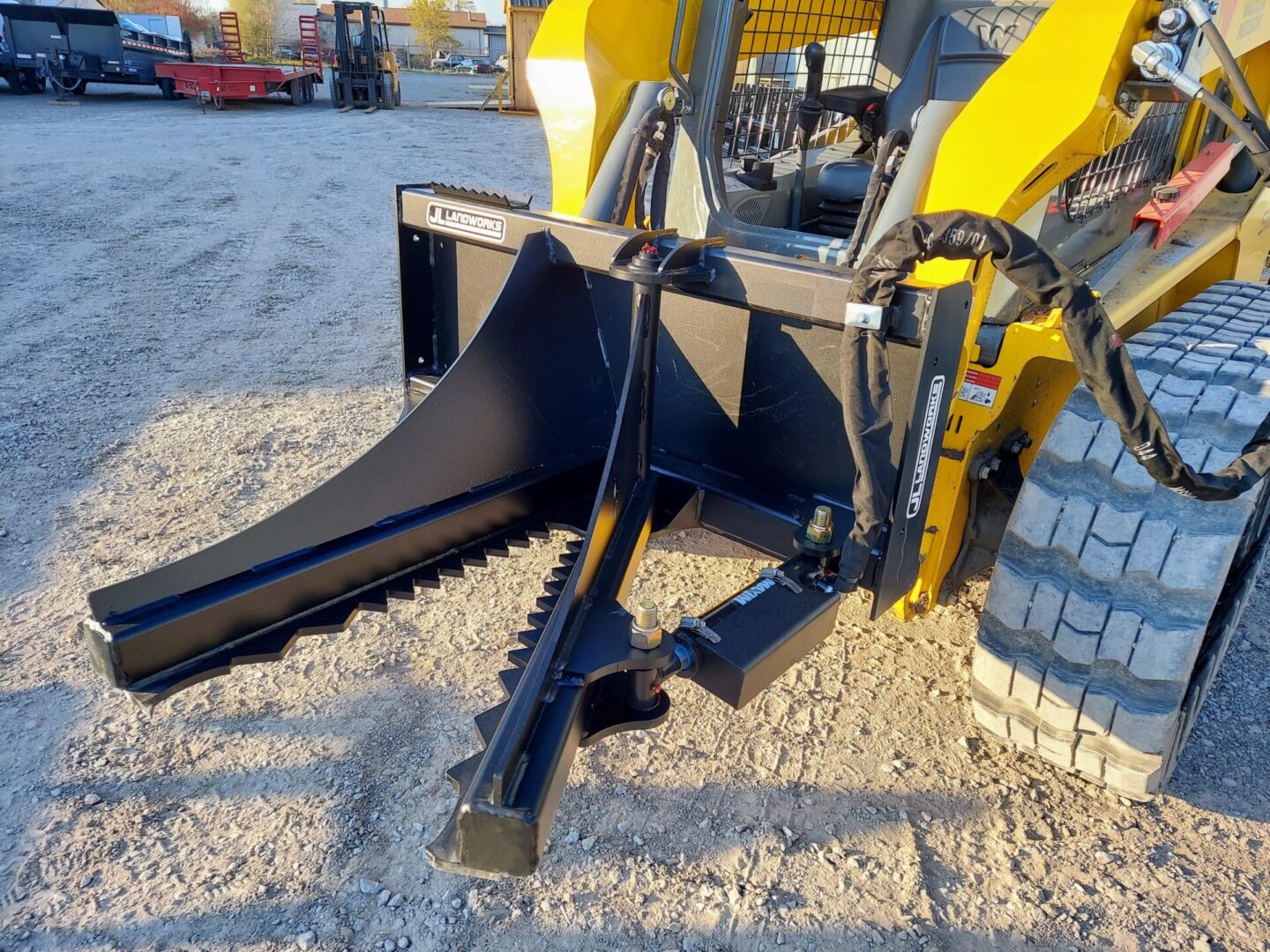 A close up of the back end of a skid steer.