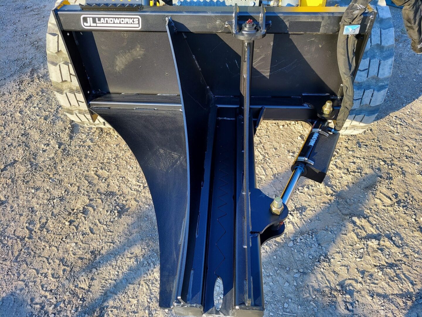 A close up of the bottom part of a tractor