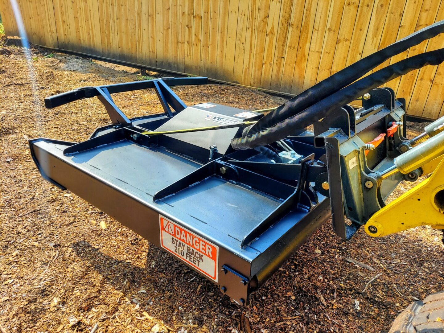 A large metal device sitting on top of a pile.