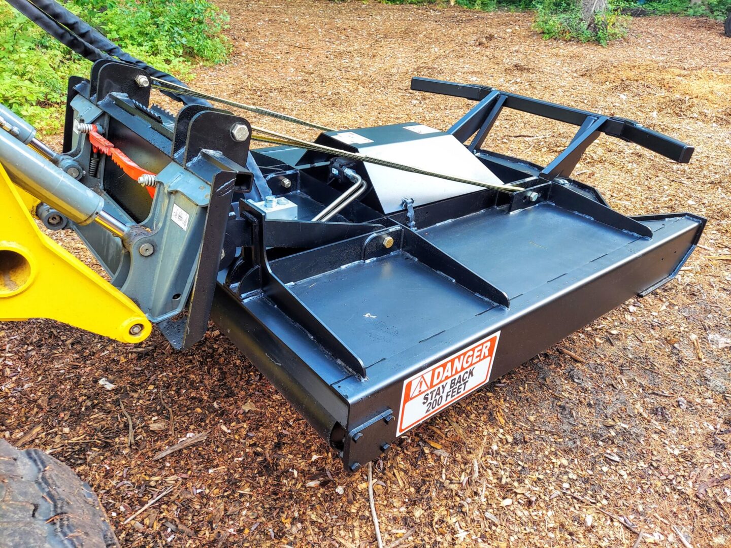 A tractor with a plow attached to it.