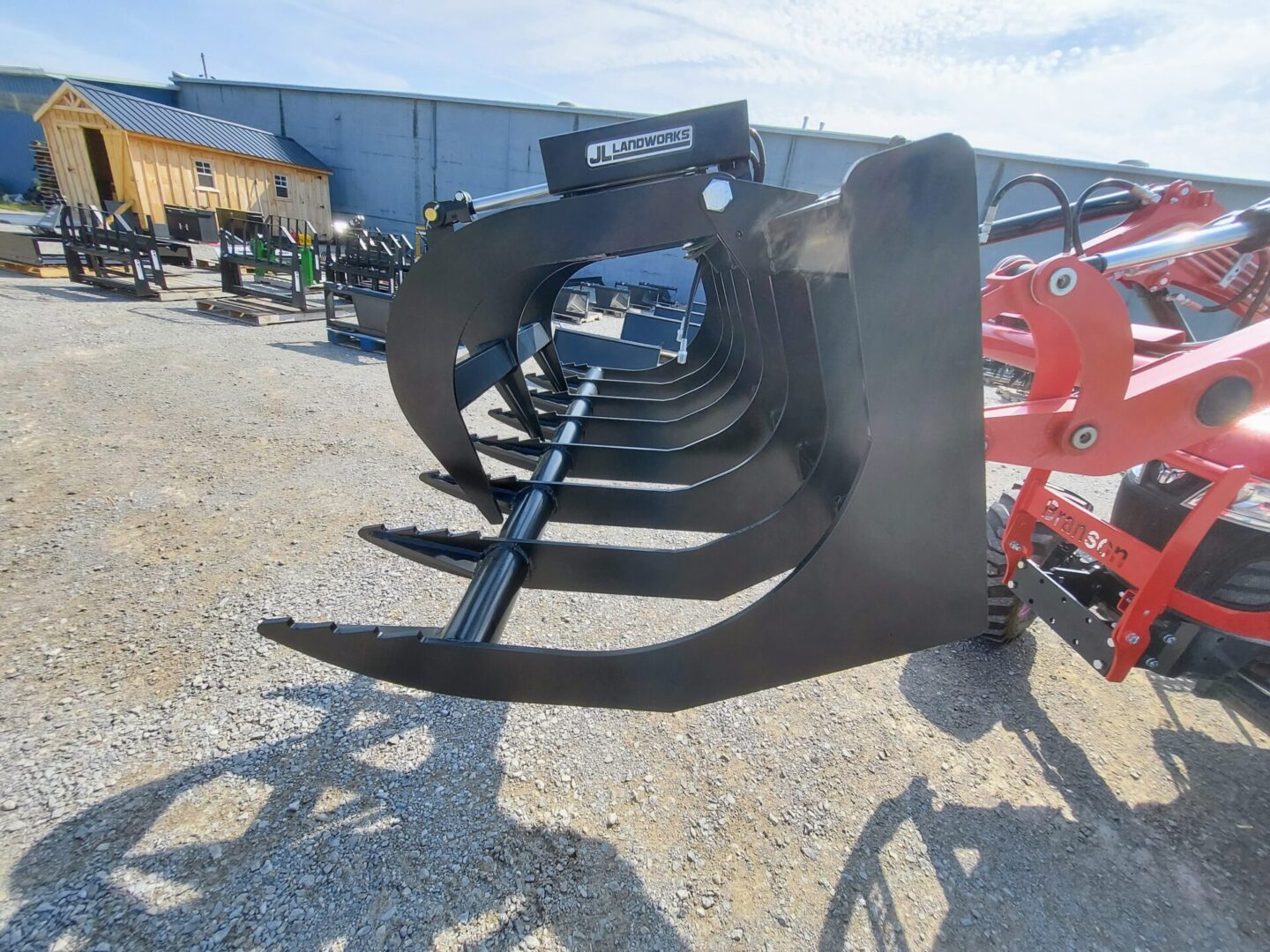 A close up of the back end of a tractor grapple