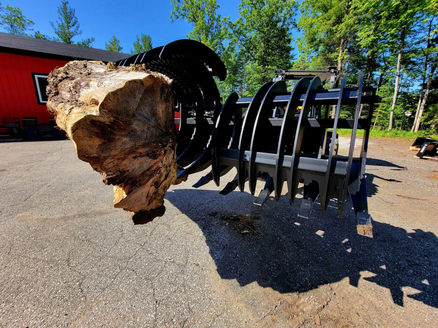 A pile of wood sitting on top of the ground.