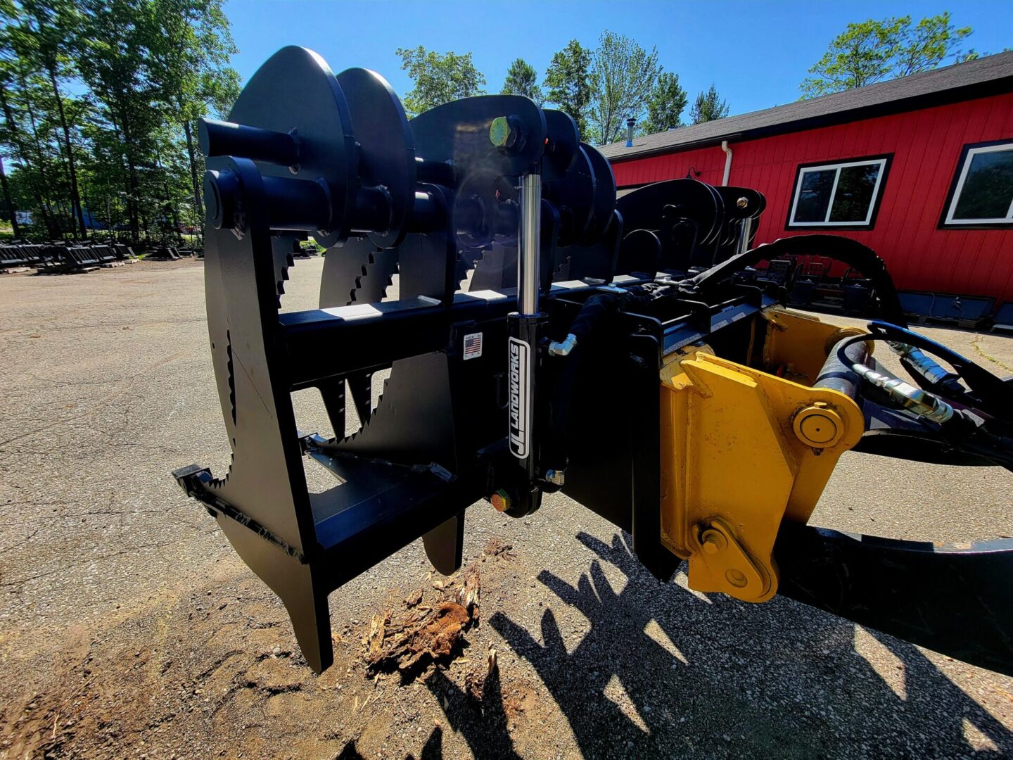 A tractor with a plow attached to it.