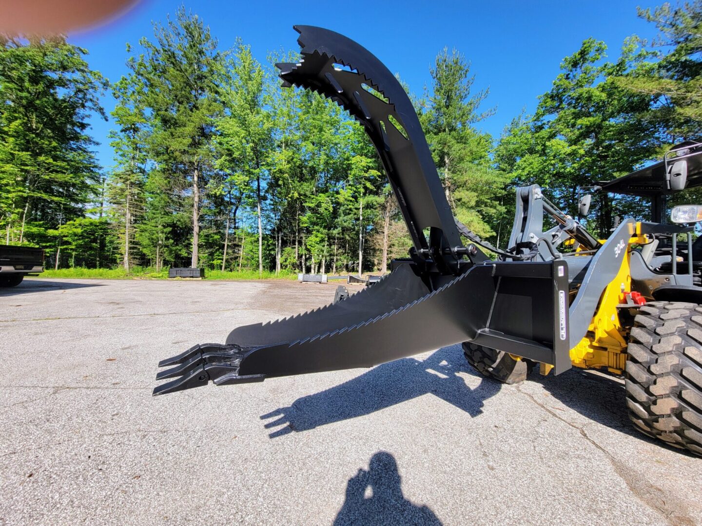 A close up of the back end of a backhoe