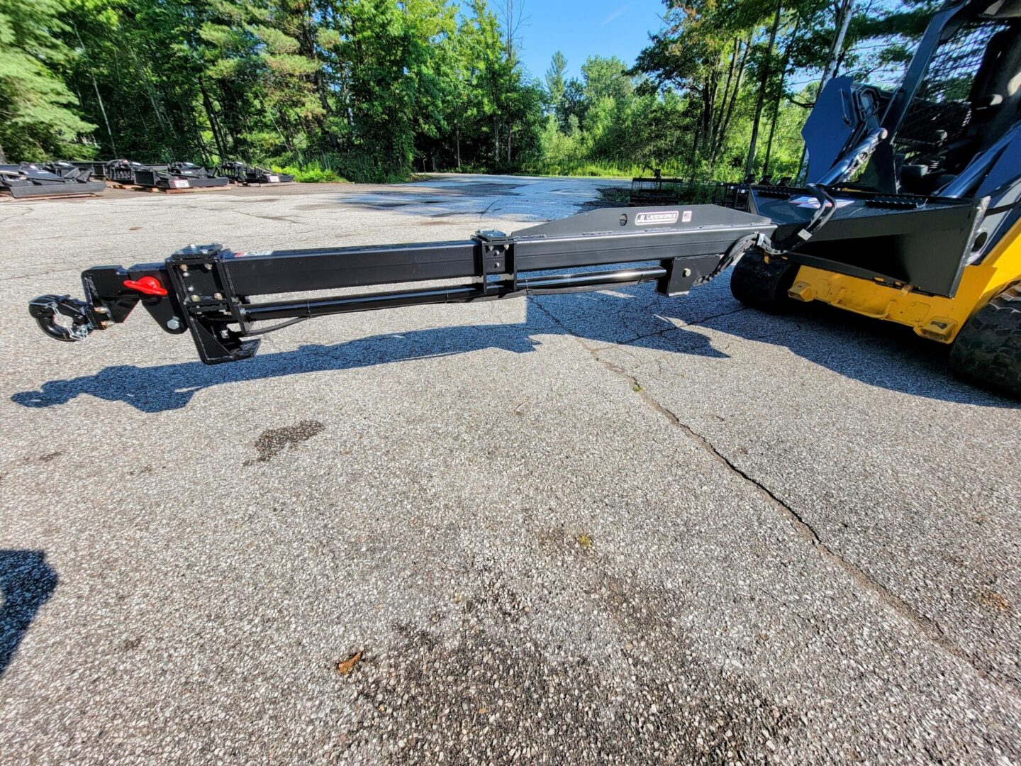 A black and yellow scooter is parked in the street