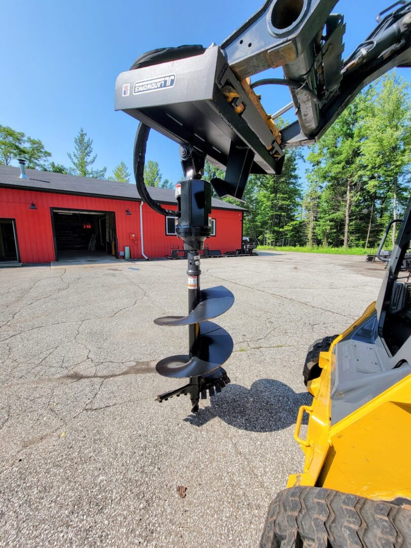 A close up of the auger on a tractor