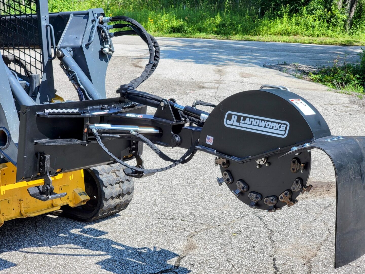 A close up of the front end of a stump grinder