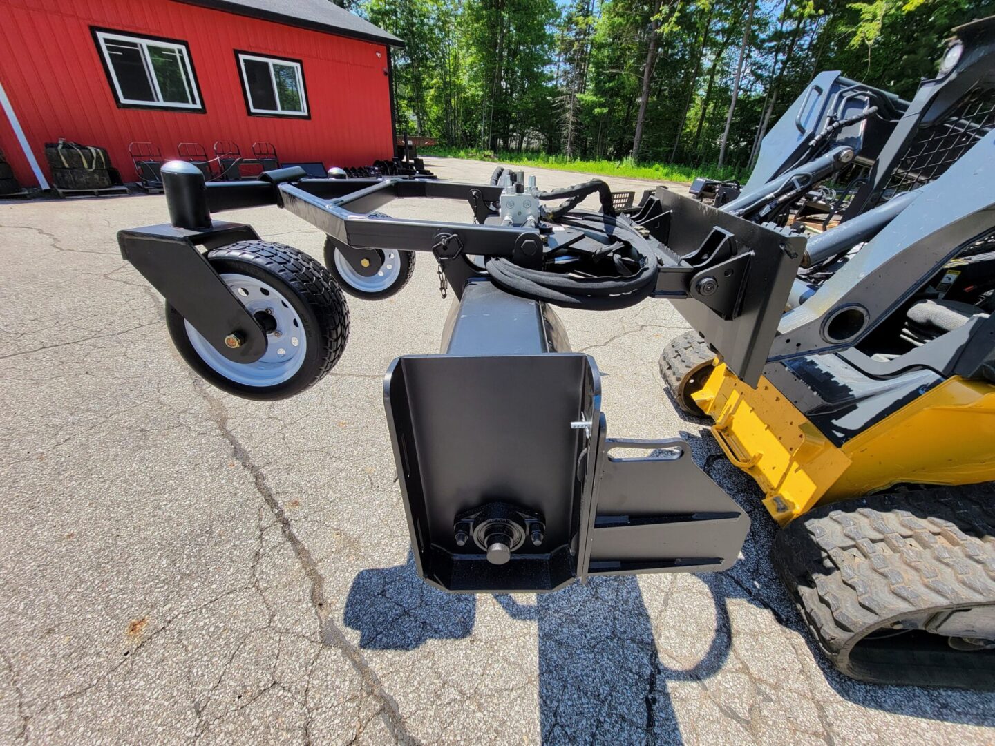 A tractor with two wheels and a trailer.