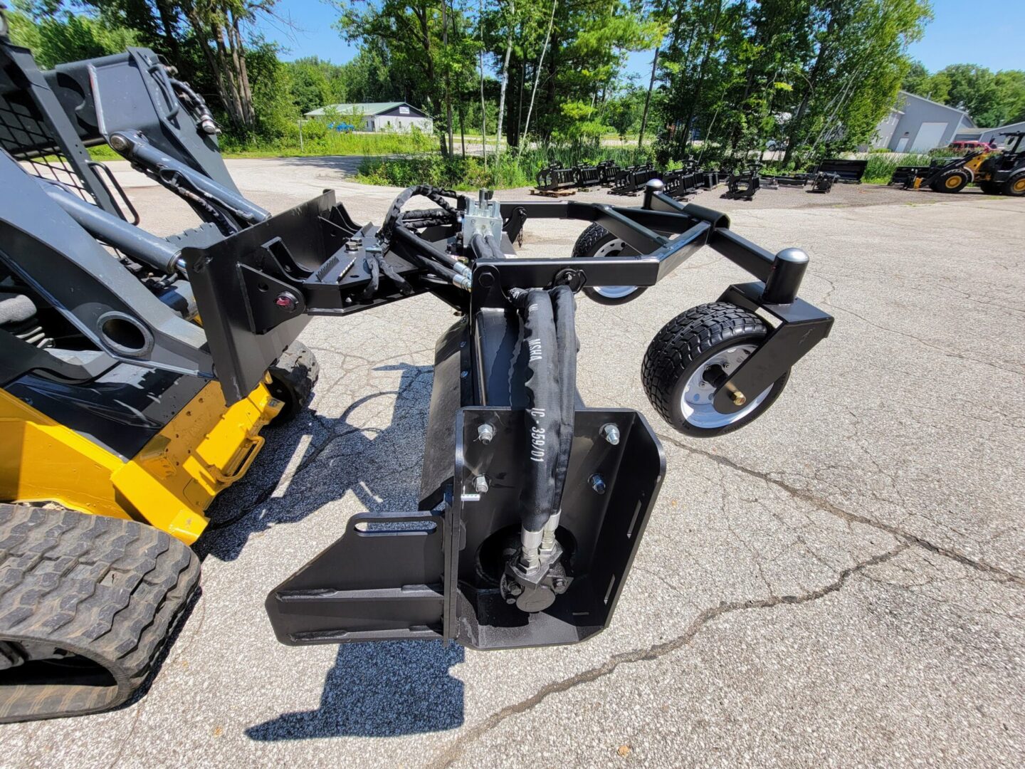 A close up of the back end of a skid steer