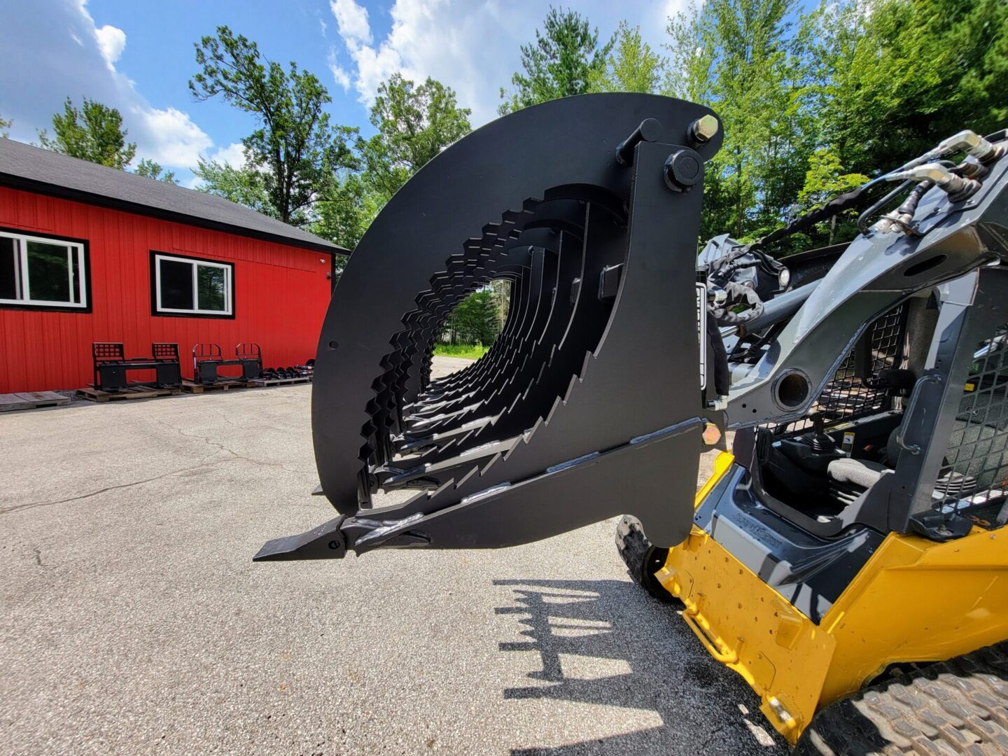 A close up of the back end of a skid steer.