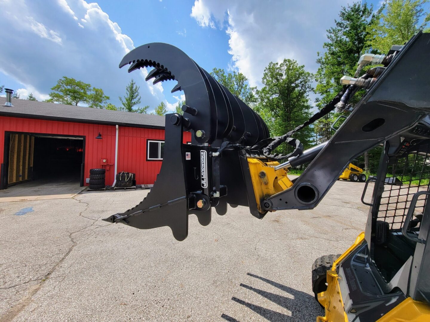 A close up of the back end of a backhoe