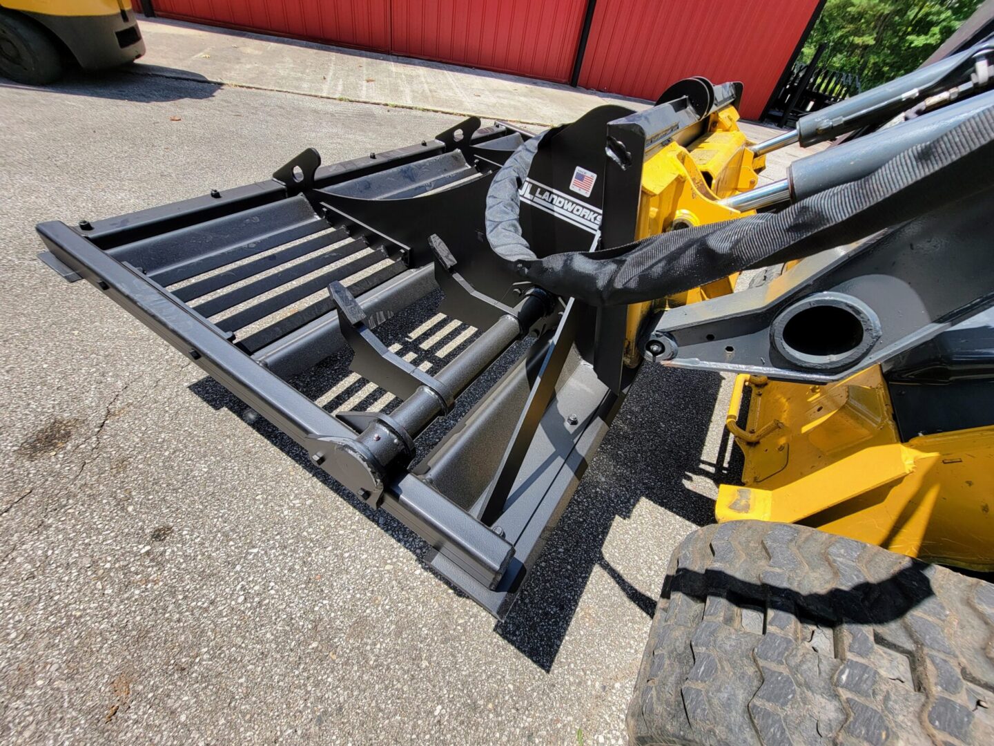 A close up of the back end of a wheel loader