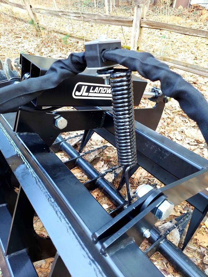 A close up of the springs on a tractor