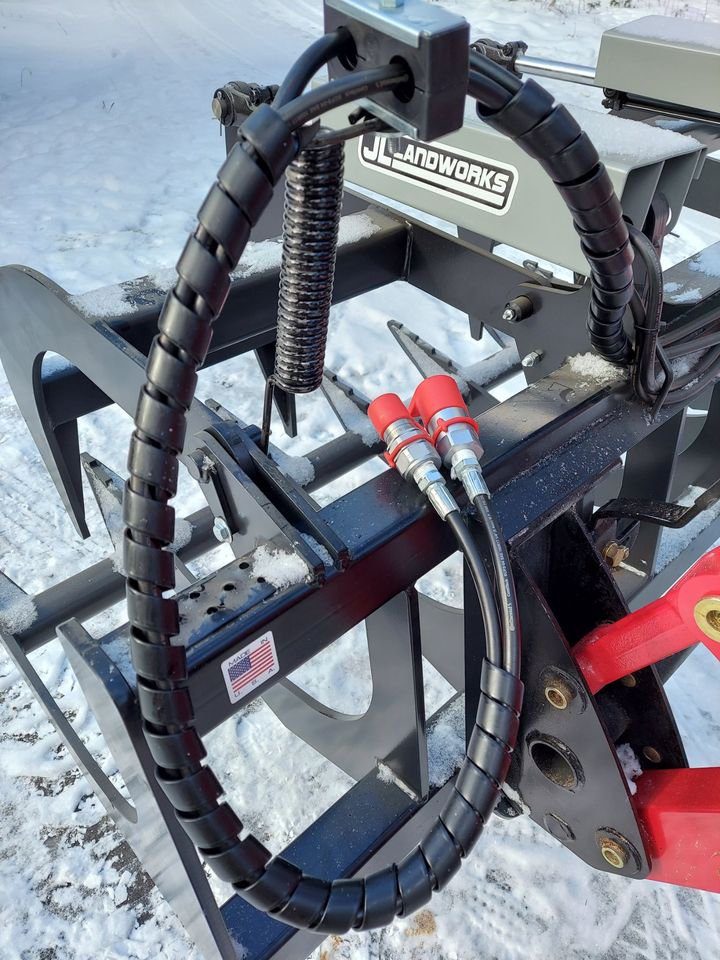 A close up of the hose on a tractor