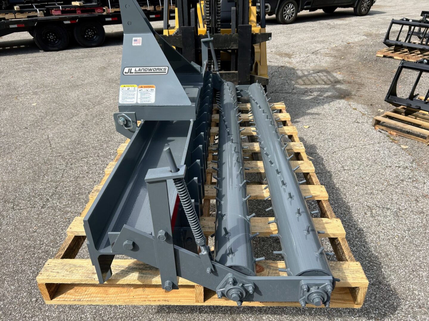 A pallet of machinery on top of wooden pallets.