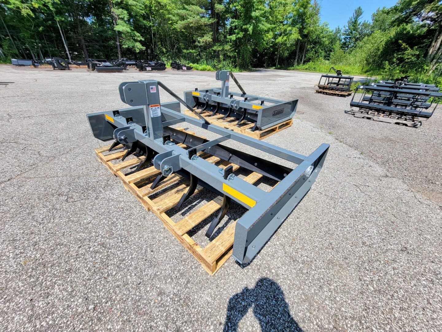 A tractor with a plow on top of it.