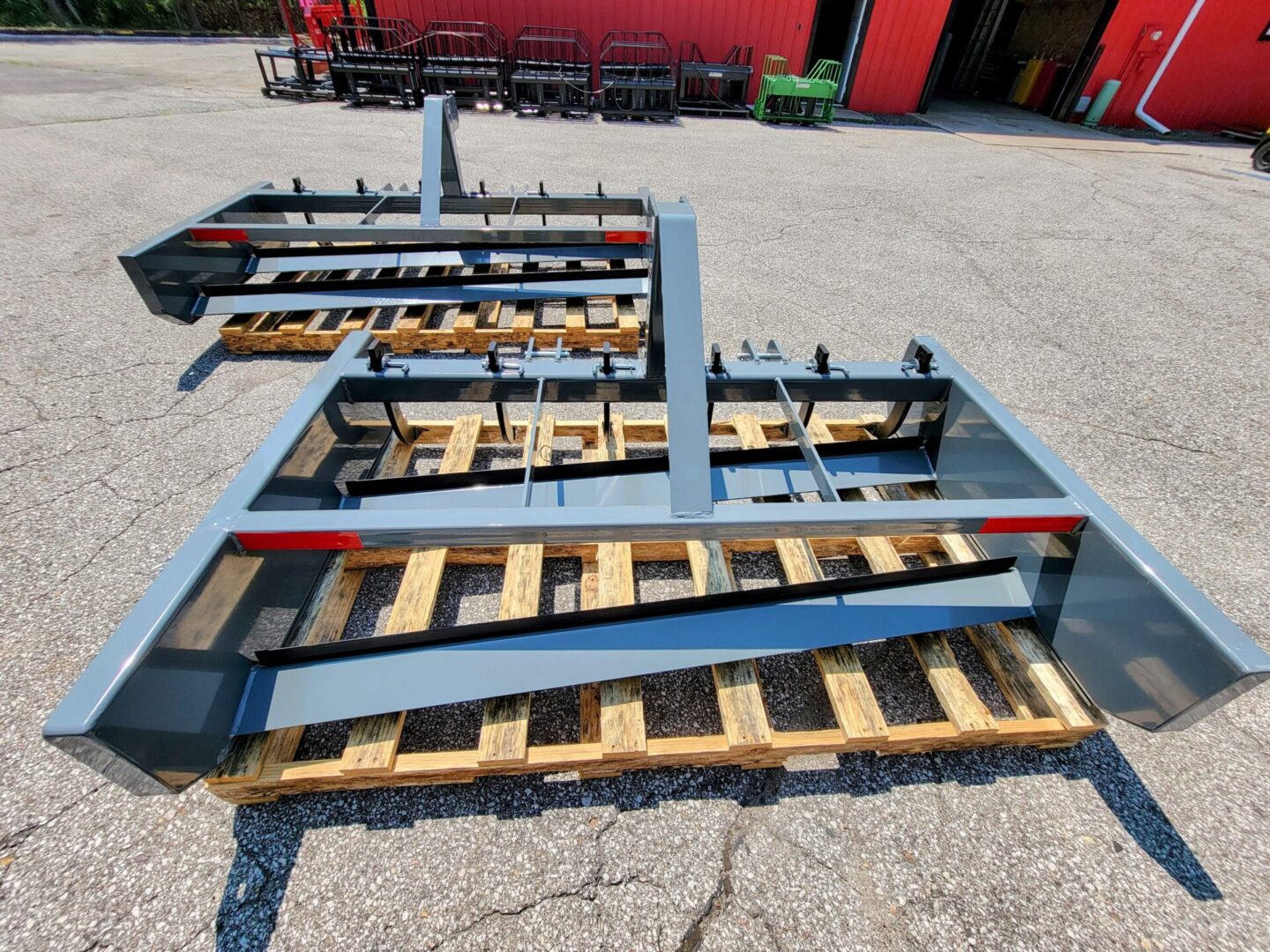 A large metal structure sitting on top of a road.