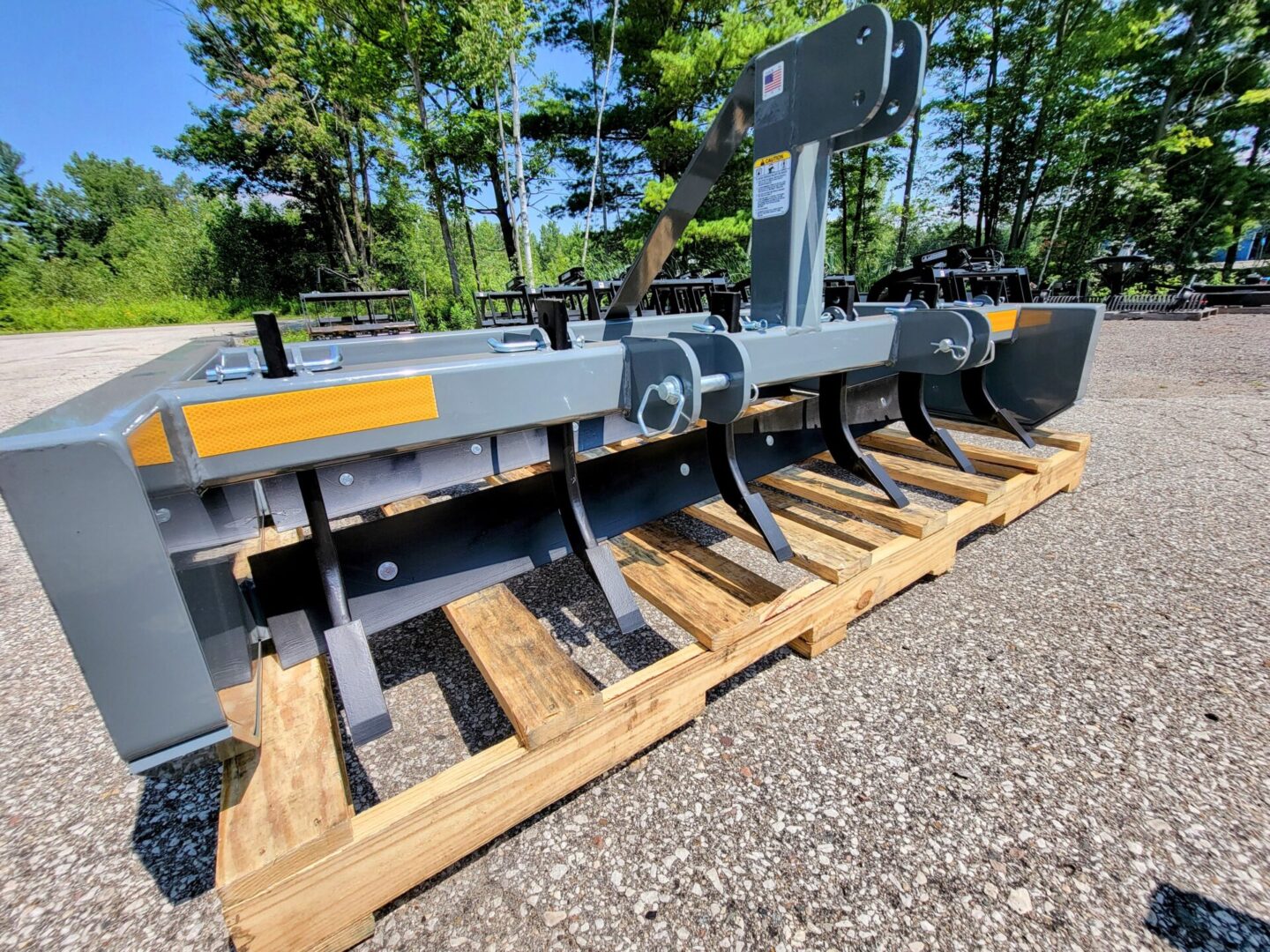 A pallet of a plow on the ground