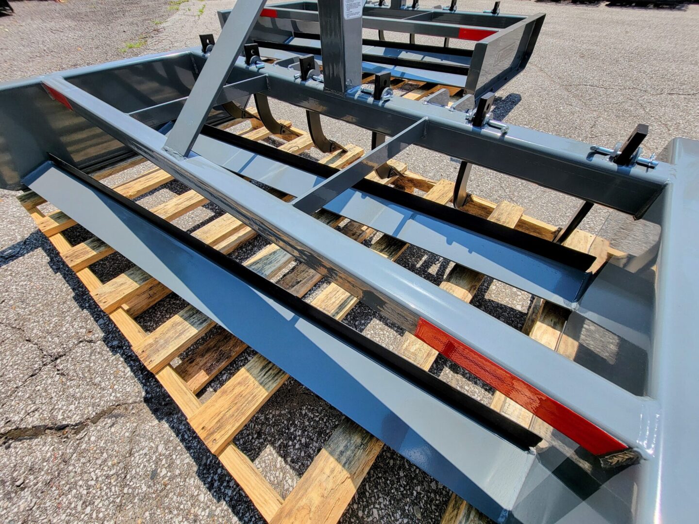 A pallet of wooden pallets with metal frames.